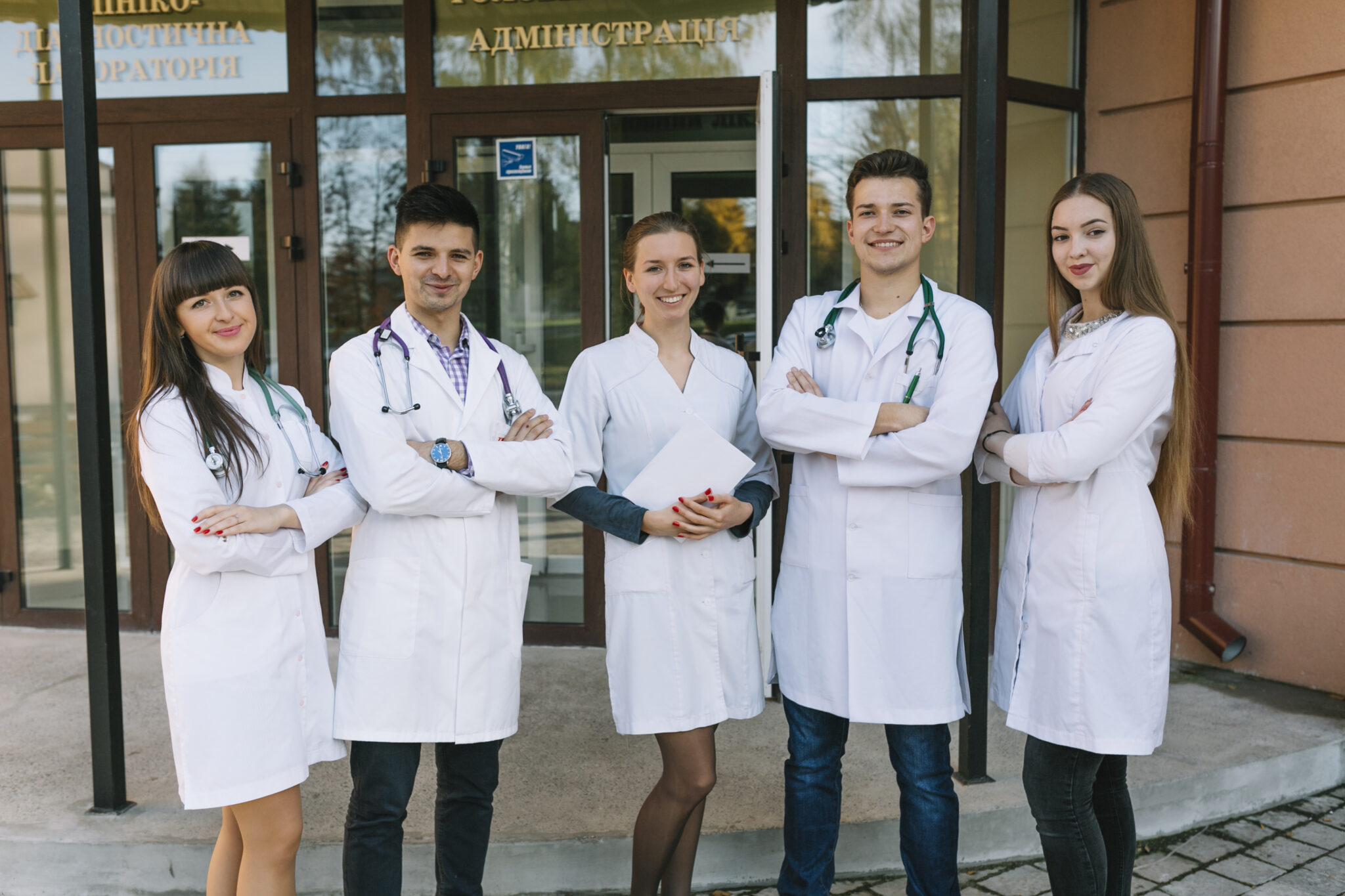 cheerful-group-medics-hospital