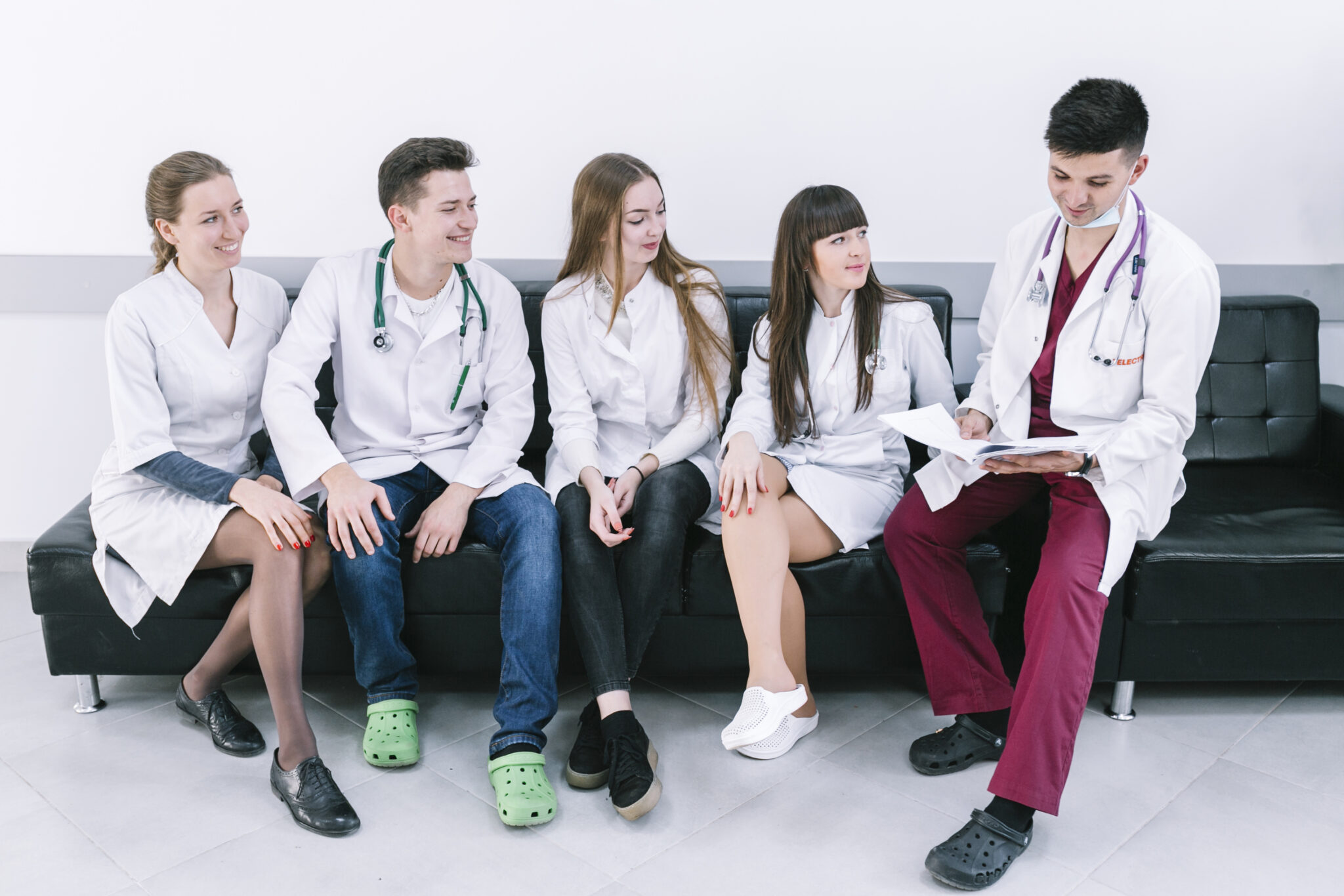 cheerful-medic-staff-sofa